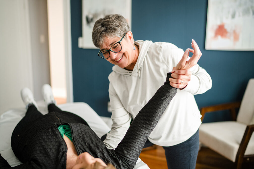 physical therapist working with a patient